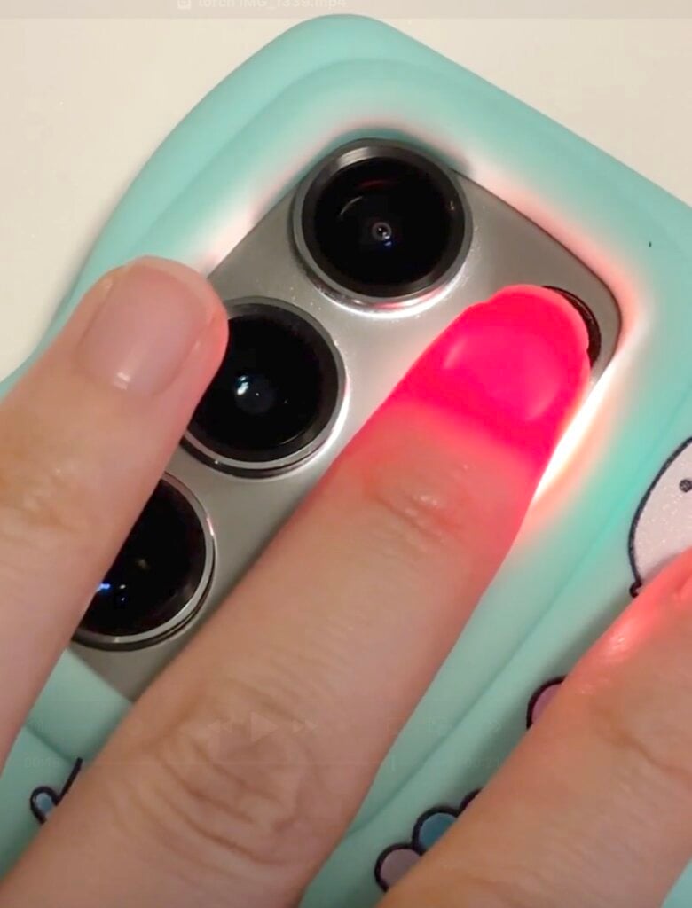 Red light going through a finger